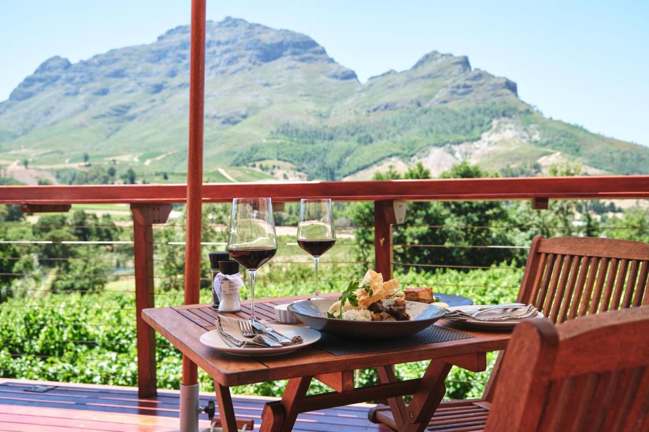 Alluvia Boutique Winery & Luxury Accommodation Stellenbosch Bagian luar foto Wine tasting at a South African winery